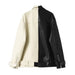 Mandotos contrast vegan leather jacket featuring a sleek design and stylish collar, shown on a model.