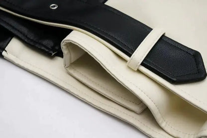 Mandotos contrast vegan leather jacket with stylish design, featuring a sleek fit and modern details for a trendy look.