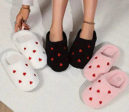 Mandotos Cushy Heart Top Fluffy Slippers with soft, plush material and heart-shaped design for cozy comfort.