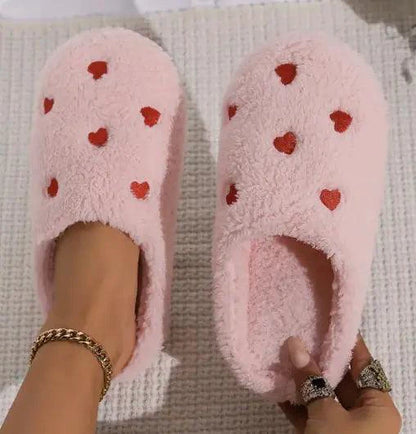 Mandotos Cushy Heart Top Fluffy Slippers featuring soft, plush material and heart-shaped design for cozy comfort.
