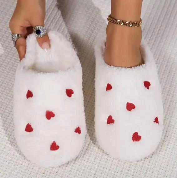 Mandotos Cushy Heart Top Fluffy Slippers with soft, plush material and heart design for cozy indoor comfort.