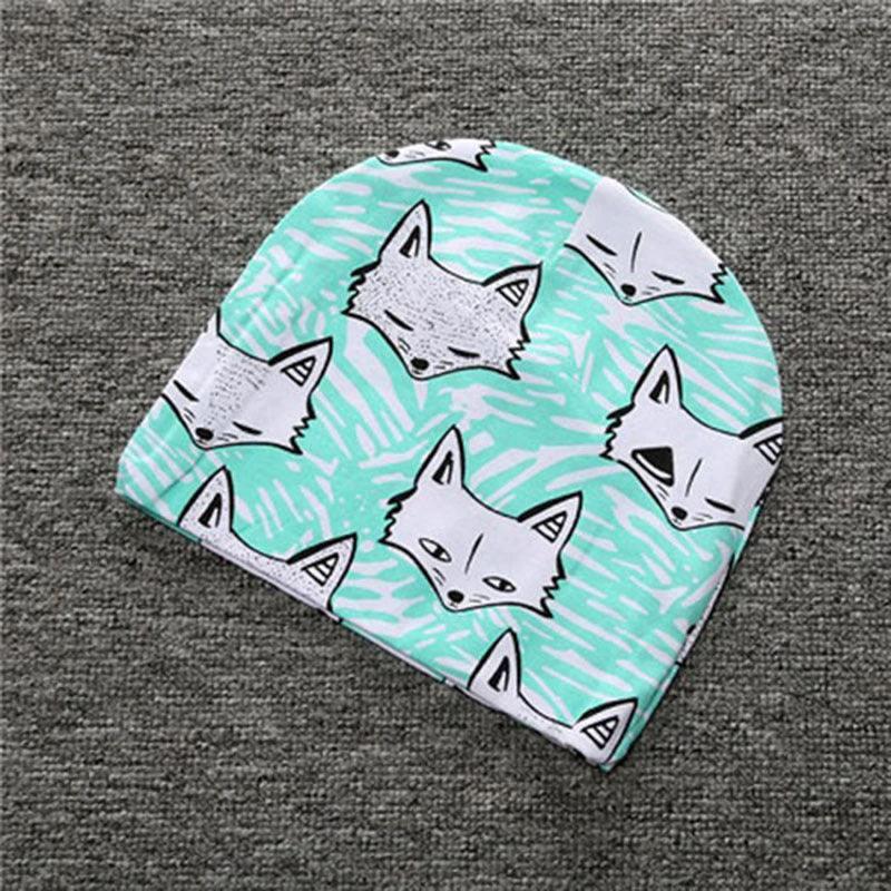 Soft cotton baby hat by MANDOTOS for infants and toddlers, featuring a cute, cozy design perfect for gentle wear.
