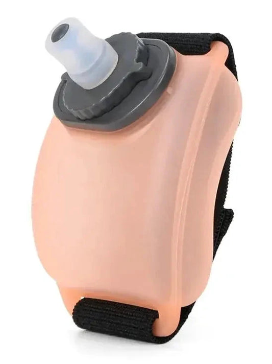 Mandotos cycling wrist water bottle on a rider's wrist, compact and lightweight hydration accessory for cyclists.