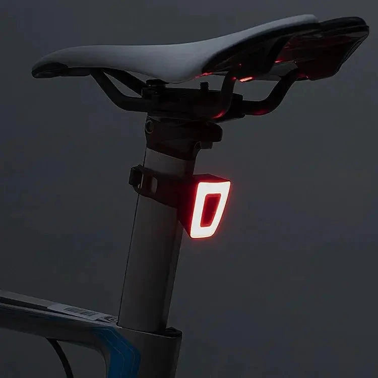 Mandotos Cyclist's Beacon USB rechargeable waterproof bike light mounted on a bicycle for visibility and safety during rides.