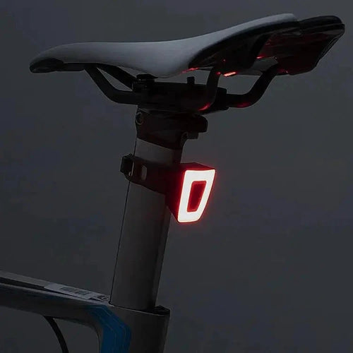 Mandotos Cyclist's Beacon USB rechargeable waterproof bike light mounted on a bicycle for visibility and safety during rides.