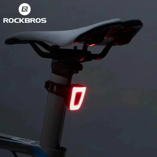Mandotos Cyclist's Beacon USB rechargeable waterproof bike light mounted on a bicycle for visibility during night riding.