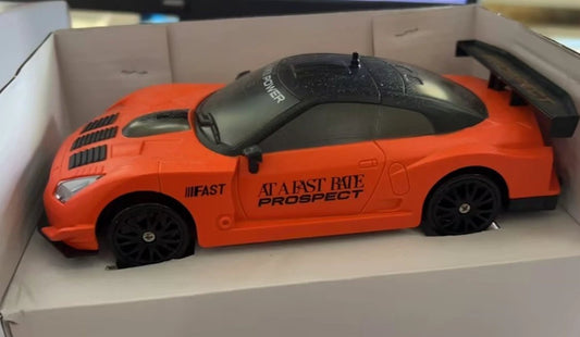 Mandotos 2.4G 4WD RC Drift Car GTR AE86 model toy with remote control, suitable for children and Christmas gifts.