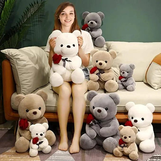 Mandotos 23-45cm plush teddy bear pillow with hugging roses design, soft stuffed animal doll, ideal for gifts on special occasions.