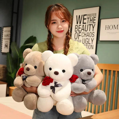 Mandotos plush teddy bear hugging roses, soft stuffed animal pillow perfect for birthday or Valentine's Day gift.