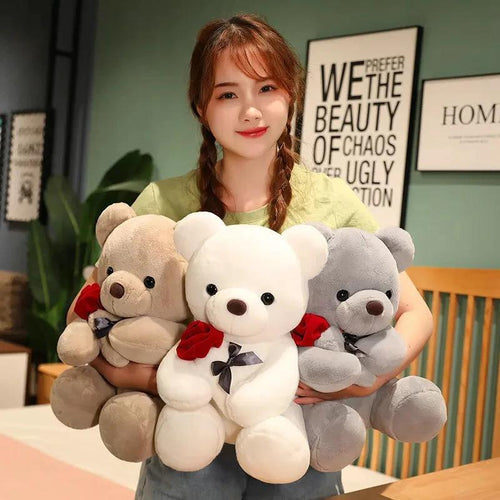 Mandotos plush teddy bear hugging roses, soft stuffed animal pillow perfect for birthday or Valentine's Day gift.