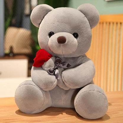 Soft plush teddy bear with hug roses design, 23-45cm, from MANDOTOS, perfect for birthdays or Valentine's Day gifts.