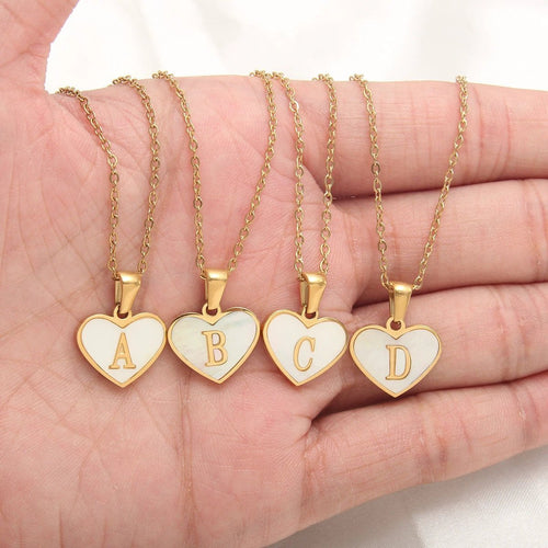 Mandotos 26-letter heart-shaped necklace with white shell love pendant on a delicate clavicle chain for women’s jewelry.