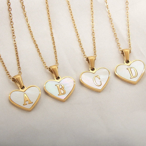 Mandotos white shell heart-shaped letter necklace with 26 customizable letters, delicate clavicle chain jewelry for women.