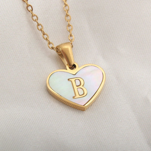 Mandotos 26-letter heart-shaped necklace with white shell love pendant on a delicate clavicle chain for women jewelry.