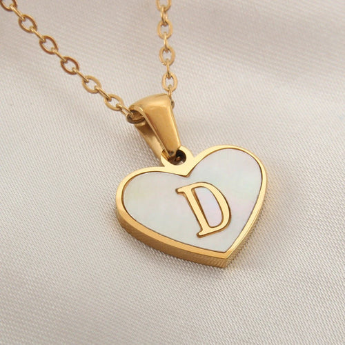 Mandotos heart-shaped necklace with 26 letter charms, white shell design, love motif, personalized jewelry for women, Valentine's Day accessory.