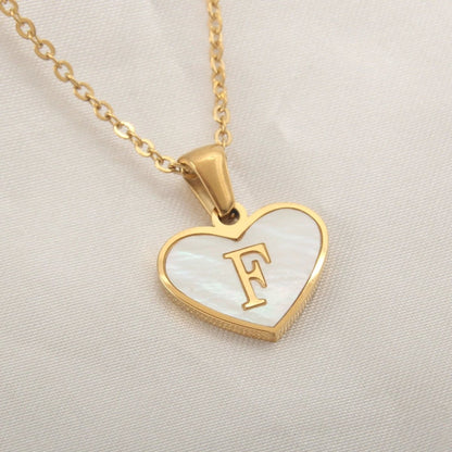 Mandotos white shell heart-shaped letter necklace with 26 letter charms, personalized clavicle chain jewelry for women, Valentine's Day accessory
