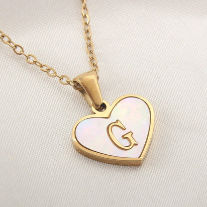 Mandotos heart-shaped necklace with 26 letter white shell design, personalized clavicle chain jewelry for women, perfect for Valentine's Day