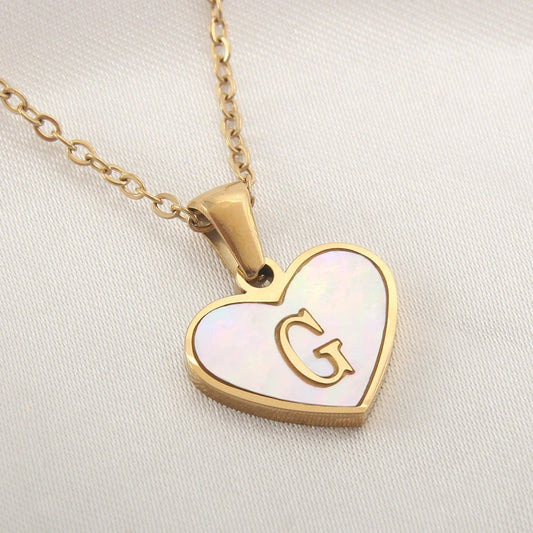 Mandotos heart-shaped necklace with 26 letter white shell design, personalized clavicle chain jewelry for women, perfect for Valentine's Day