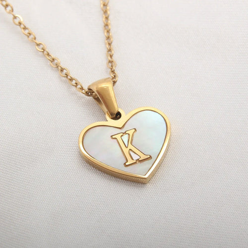 Mandotos heart-shaped necklace with 26 letter charms, white shell accents, and a delicate clavicle chain for women’s jewelry.