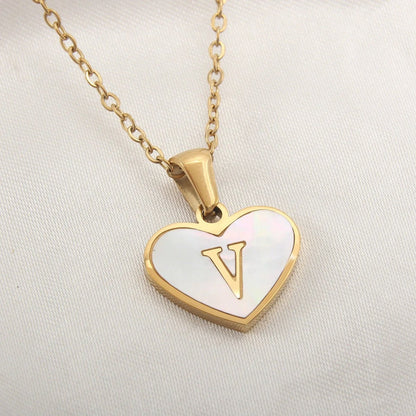 Mandotos white shell 26-letter heart-shaped love necklace for women, personalized clavicle chain jewelry, perfect for Valentine's Day.