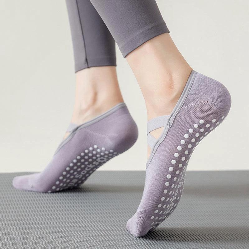 Mandotos yoga socks for women with non-slip grips, straps for stability, ideal for Pilates, ballet, dance, and barefoot workouts.