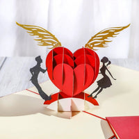 Mandotos 3D laser-cut engagement card featuring a red heart and romantic silhouette, with intricate design details.