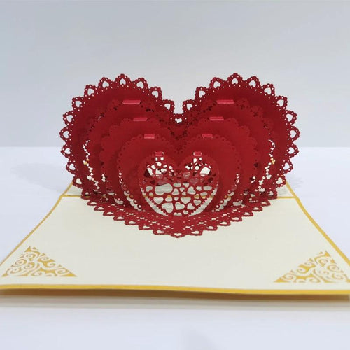 Mandotos 3D laser-cut engagement card with red heart and romantic silhouette, featuring intricate heart and love-themed design.