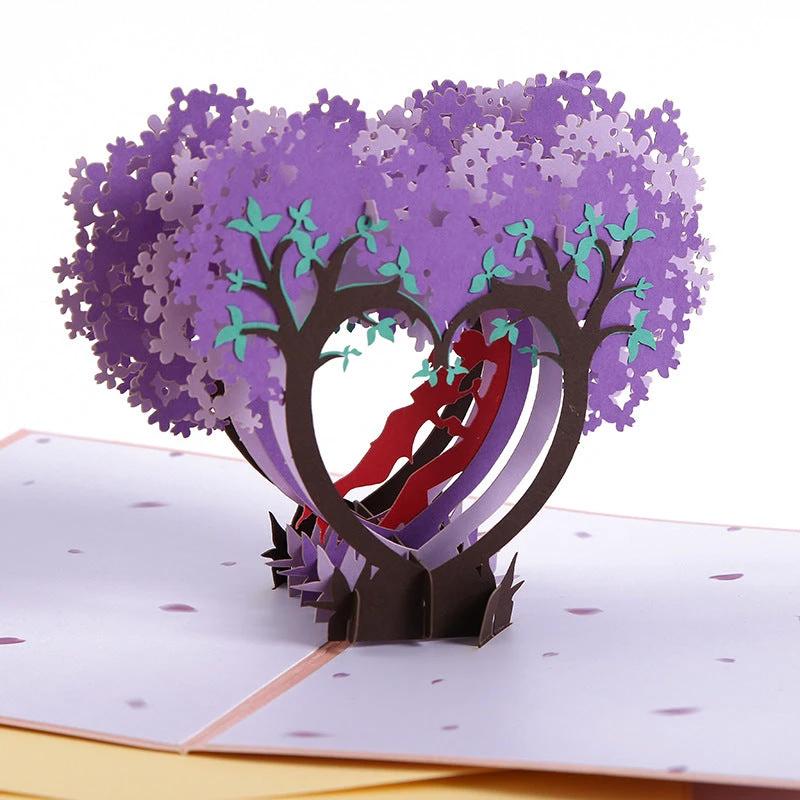 Mandotos 3D laser-cut engagement card with red heart and romantic silhouette, featuring intricate design and elegant details.