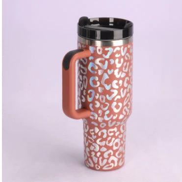 Mandotos 40 oz stainless steel insulated tumbler with handle, spill-proof lid, straw, ideal for coffee, travel, gym, and office use.
