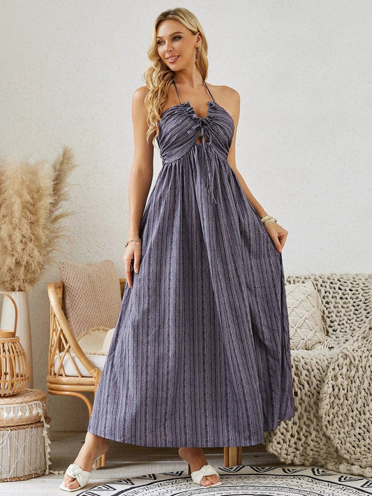 Mandotos bohemian halter maxi dress for women, sleeveless flowy beach dress with a relaxed summer style and vibrant pattern.