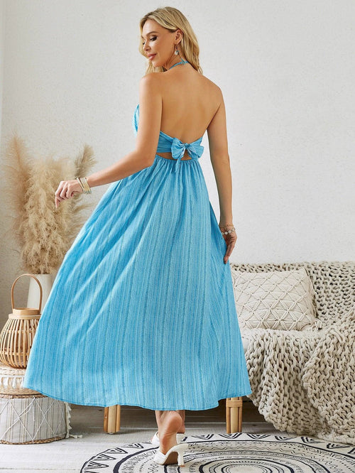 Mandotos women's bohemian halter maxi dress, sleeveless and flowy, ideal for summer beachwear, with a relaxed, breezy style.
