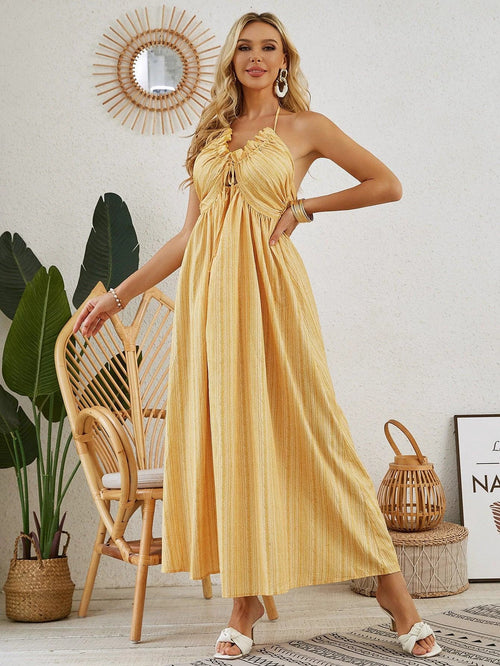 Mandotos bohemian halter maxi dress for women, sleeveless and flowy, perfect for summer beachwear and casual outdoor events.
