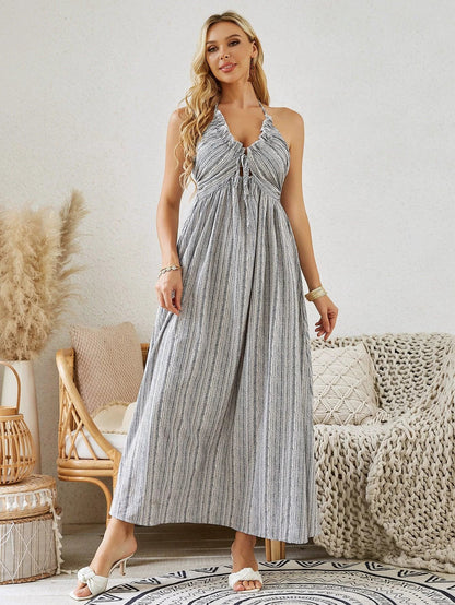 Mandotos women's bohemian halter maxi dress with summer stripes, sleeveless, flowy design perfect for beach or casual summer wear.