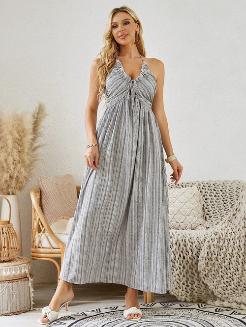 Mandotos women's bohemian halter maxi dress with summer stripes, sleeveless, flowy design perfect for beach or casual summer wear.