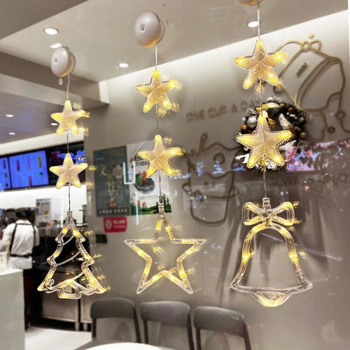 Mandotos Christmas 3-pack LED star hanging lights with suction cups, battery-powered home decor lights.