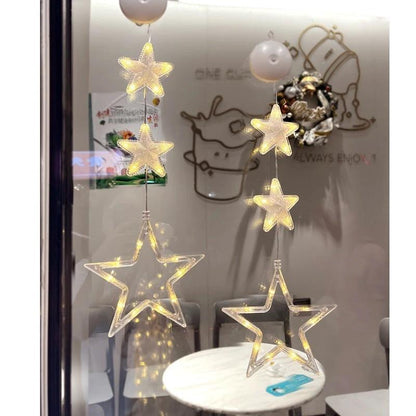 Mandotos Christmas 3-pack LED star hanging lights with suction cups, battery-powered for home decor and festive decoration.