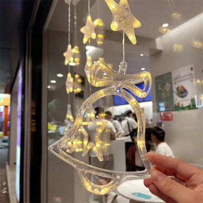 Mandotos Christmas 3-piece LED star hanging lights with suction cups, battery-powered for festive home decor.