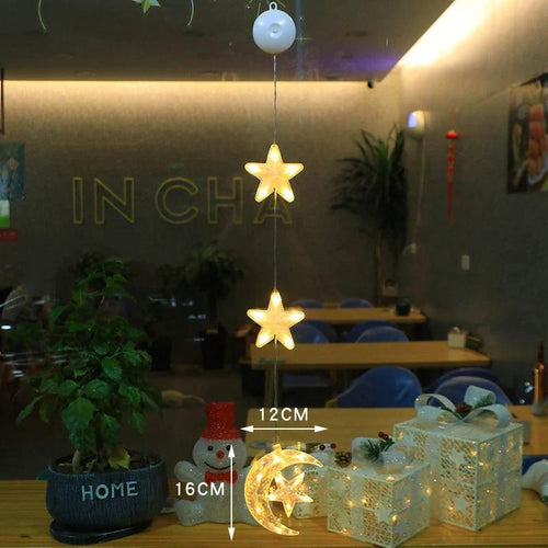 Mandotos Christmas 3-piece LED star hanging lights with suction cups, battery-powered for home holiday decor.