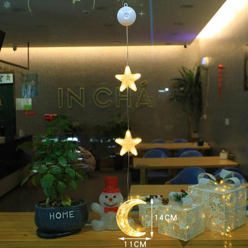 Mandotos Christmas 3-pack LED star hanging lights with suction cups, battery-powered for home decor and festive lighting.