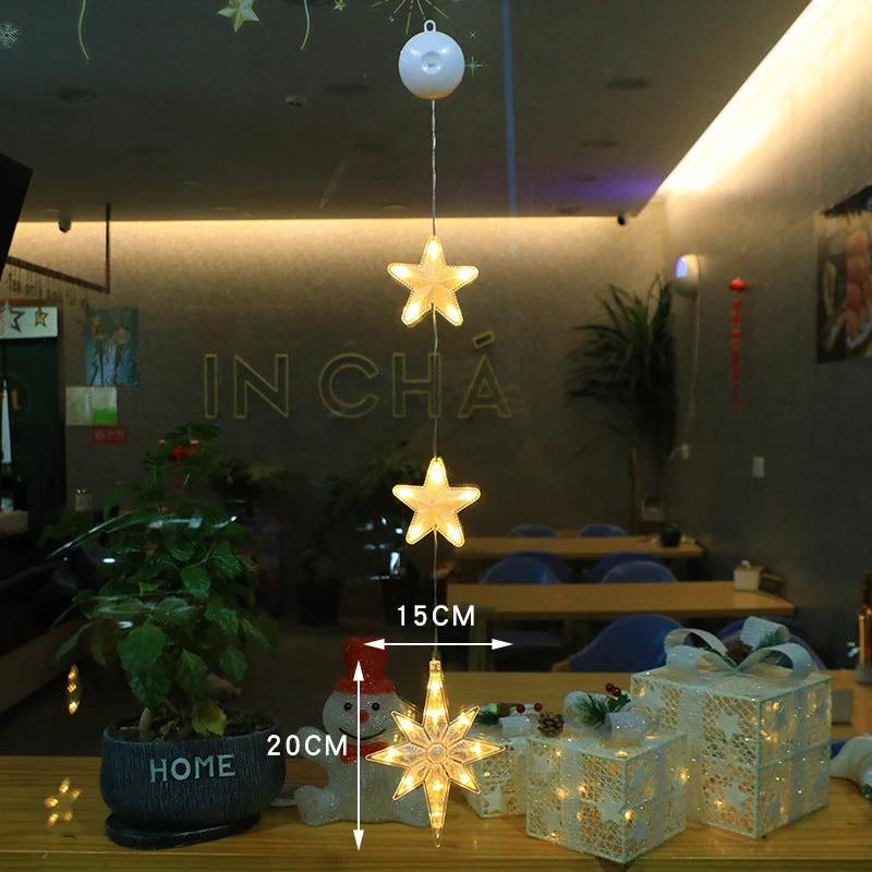 Mandotos Christmas 3-piece LED star hanging lights with suction cups, battery-powered for festive home decor.
