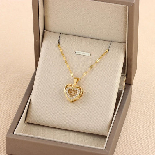 Double-layer love necklace by Mandotos with rhinestone accents and titanium steel pendant, showcasing a stylish jewelry design.