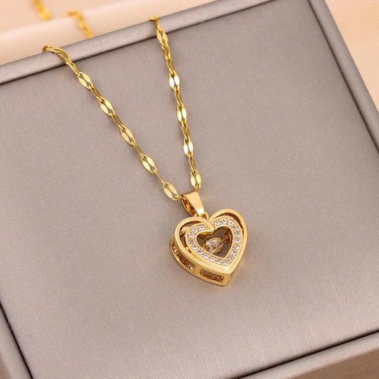 Double-layer love necklace by MANDOTOS featuring rhinestone accents and titanium steel pendant, stylish and elegant jewelry piece.