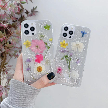 Silver foil dried flowers by Elysian Designs for epoxy phone cases, featuring elegant, unique decor with silver accents and floral details.
