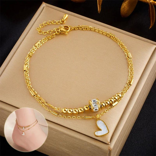 Mandotos boho love heart ankle chain with double-layer design, charm tassels, and leg chain for women’s party jewelry accessories.