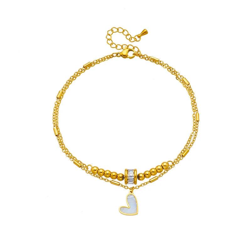 Mandotos boho love heart ankle chain with double layers, charm tassels, and leg chain design for women’s party jewelry accessories.