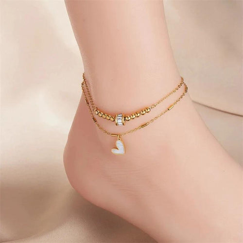 Mandotos boho love heart ankle chain with double layer design, charm tassels, and leg chain for women’s party jewelry and accessories.