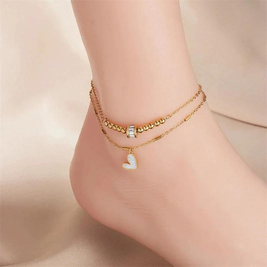 Mandotos boho love heart ankle chain with double layer design, charm tassels, and leg chain for women’s party jewelry and accessories.