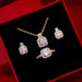 Mandotos fashion jewelry set with zircon gem necklace, matching earrings, and ring on a white background