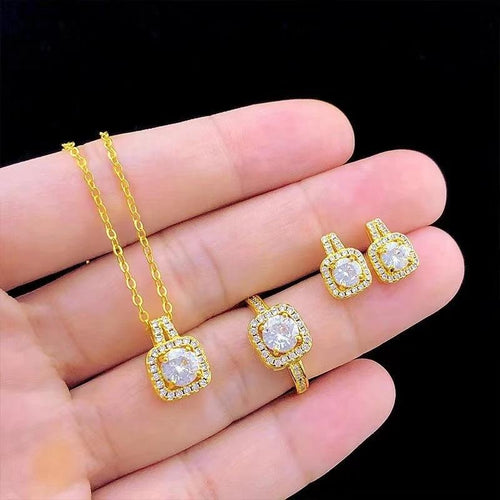 Mandotos fashion jewelry set with zircon gem necklace, matching earrings, and ring, featuring sparkling stones and elegant design