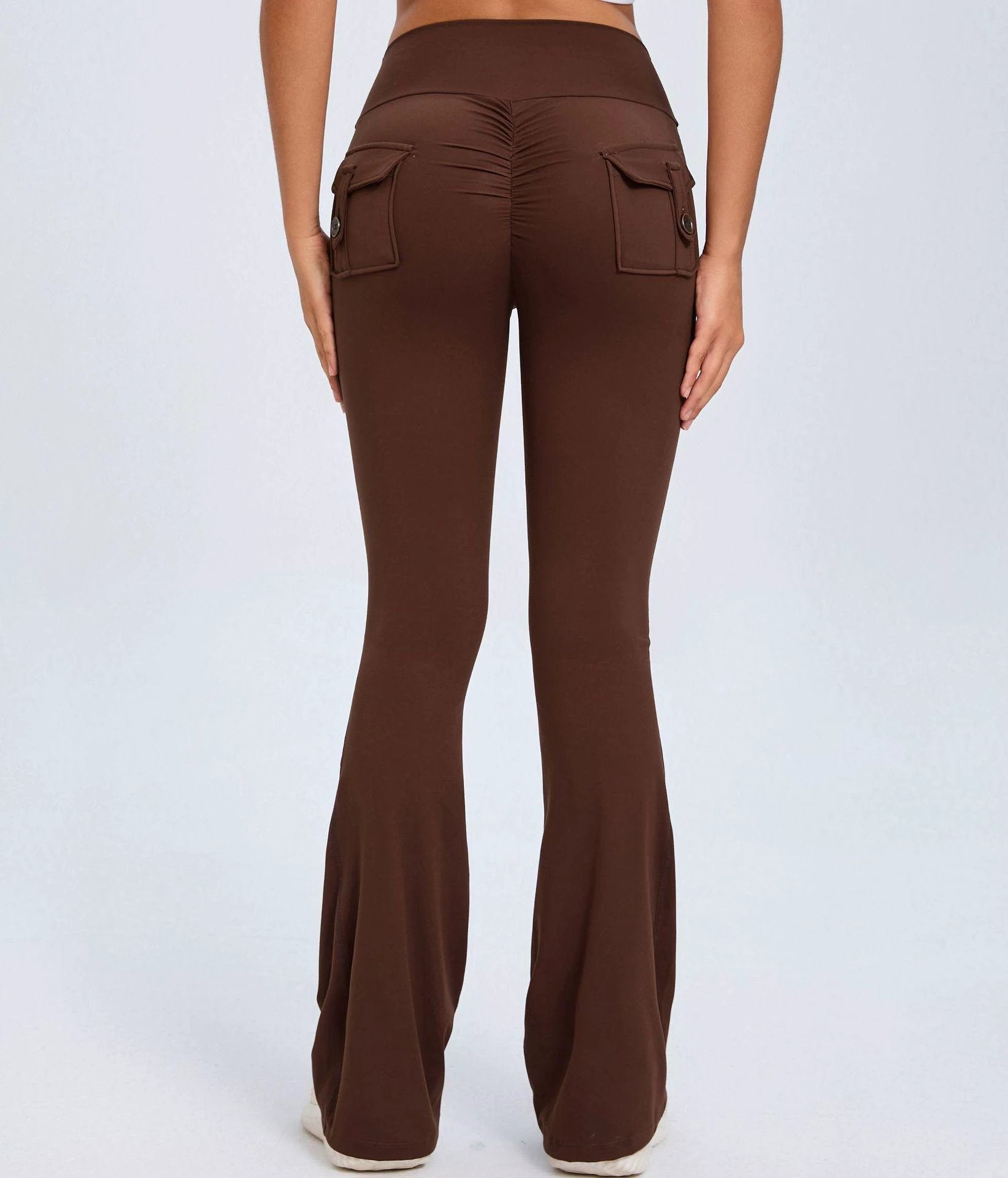 Mandotos Fierce Fit yoga pants with high waist, flared legs, pockets, and scrunch butt lift for comfort and style.